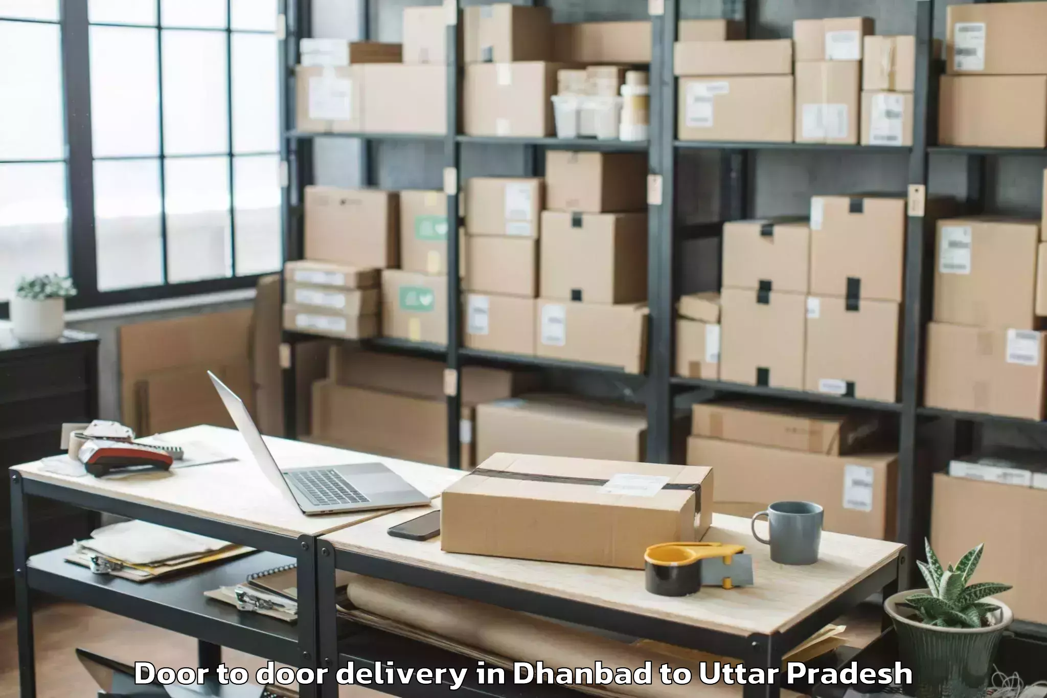 Professional Dhanbad to Mau Door To Door Delivery